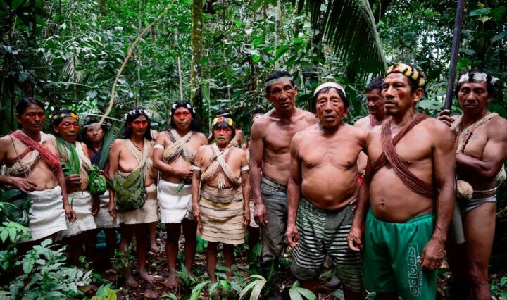Huaorani tribe of Ecuador sing to thank nature at the Teata sacred waterfall, near the village of Nemompare, on the banks of the Curaray river, in Pastaza Province, Ecuador. AFP
