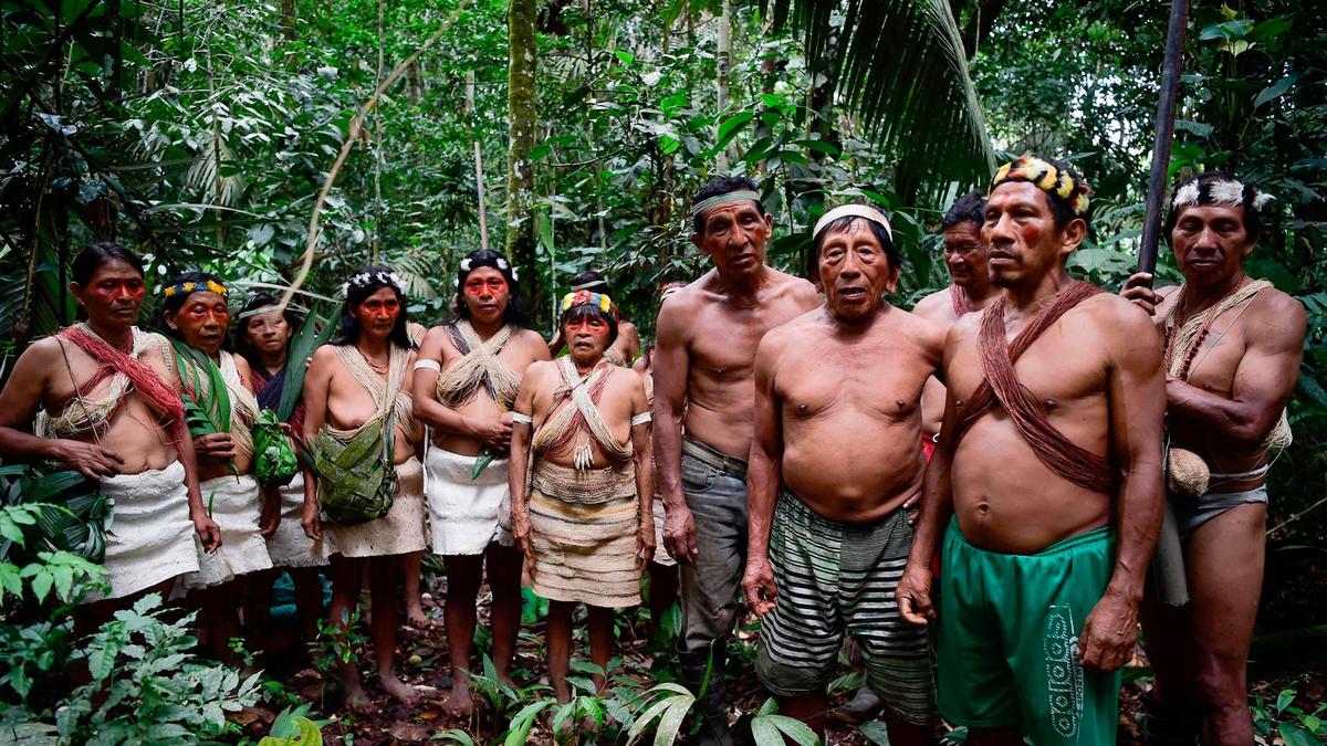 Huaorani tribe of Ecuador sing to thank nature at the Teata sacred waterfall, near the village of Nemompare, on the banks of the Curaray river, in Pastaza Province, Ecuador. AFP