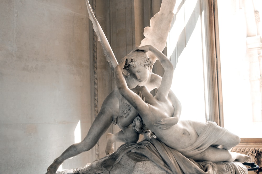 Image of a sculpture in the Louvre, 'Psyche revived by cupid's kiss'