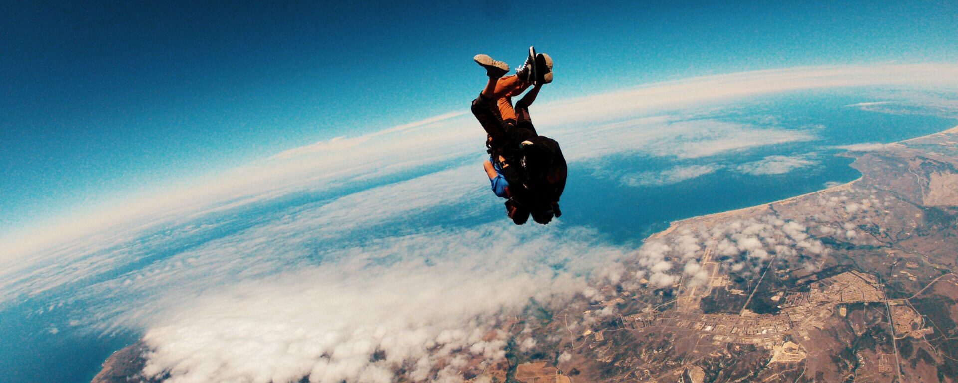 Person skydiving at daytime.