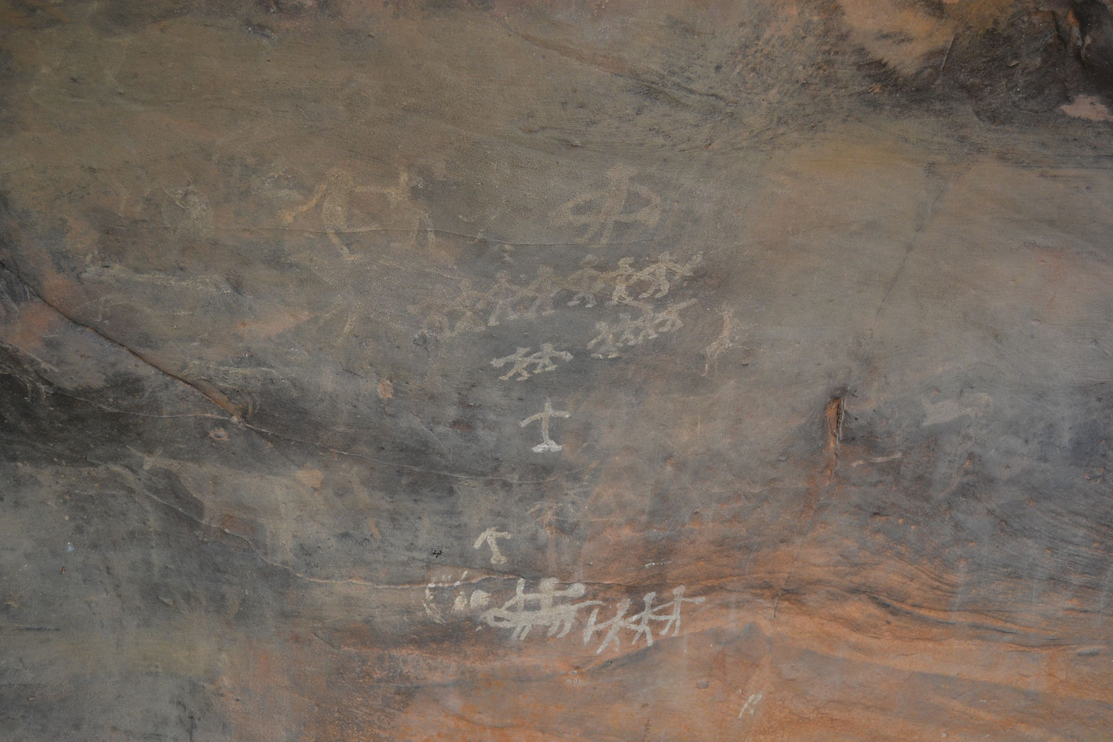 The Mesolithic people shown dancing in a cave painting in Bhimbetka rock shelters.