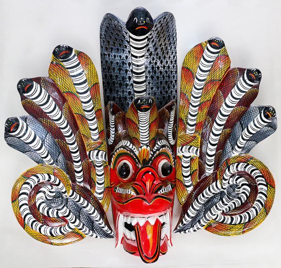 The Naga Mask helps keep away from snake bites. It is an elaborately decorated mask with multiple cobra snakes adorning the demon face.