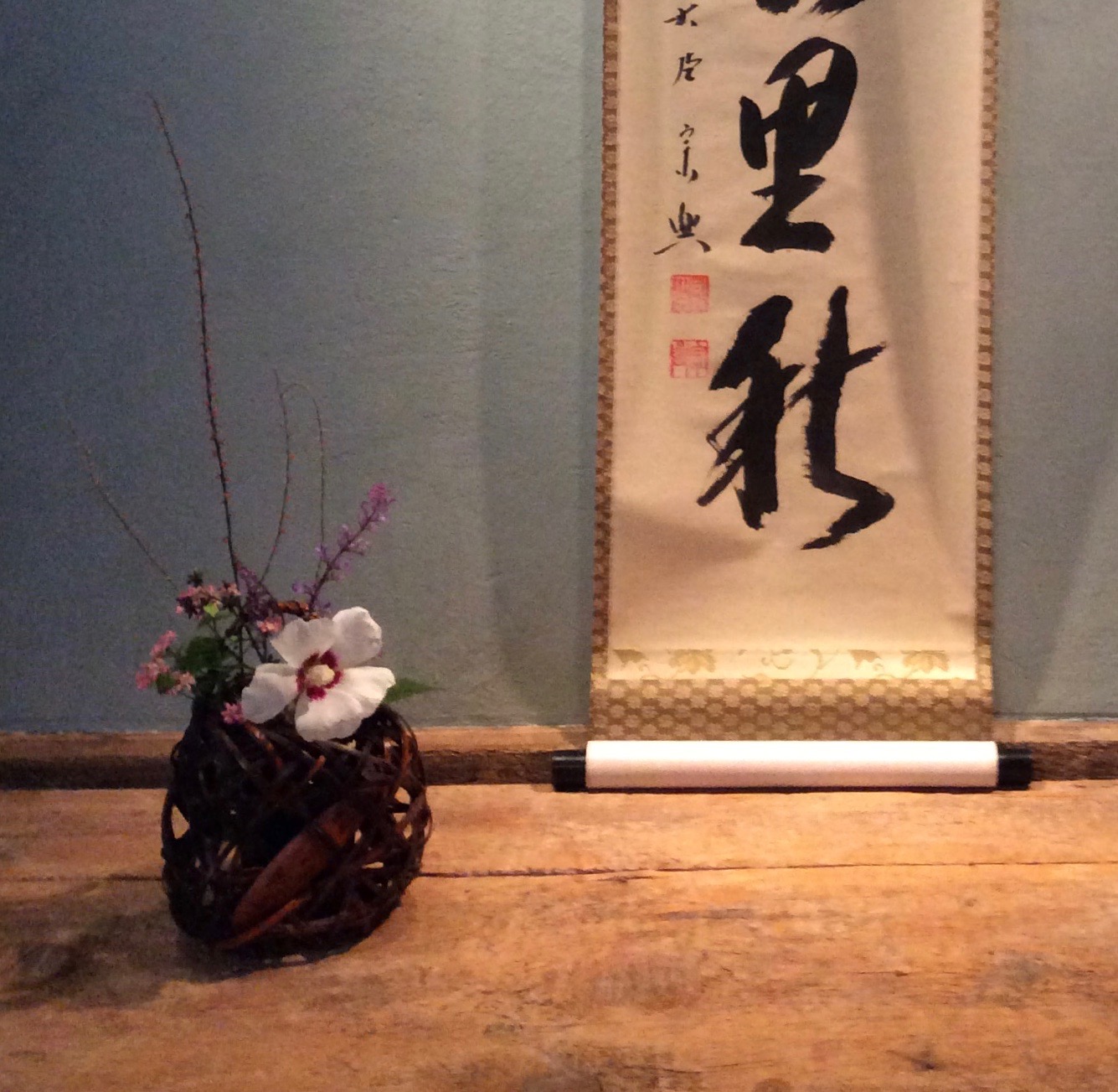 A flower is arranged for the tea ceremony.
