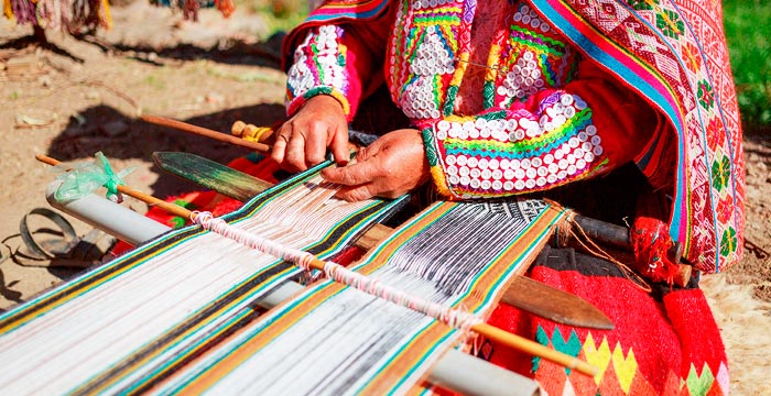 A Quechua woman weaving