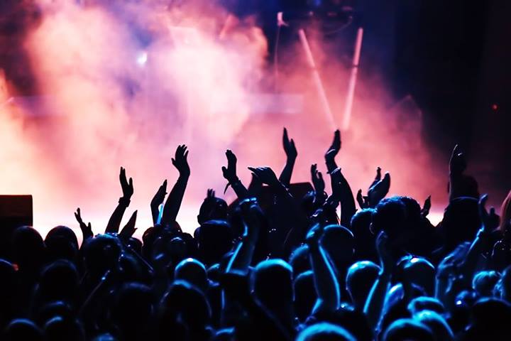 This image shows what it typically looks like from a crowd watching a concert (featured image).