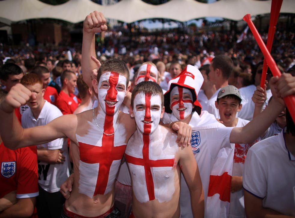 A group of fans supporitng England as part of English footballing culture