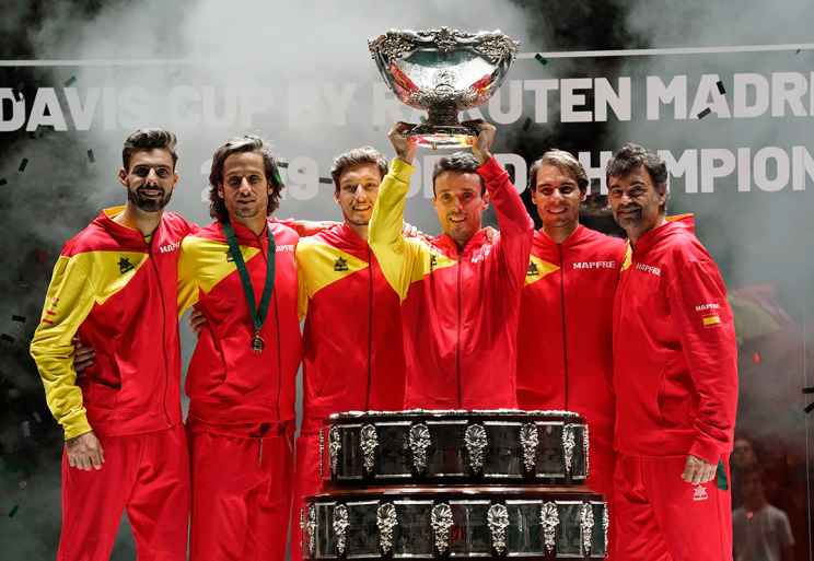 Current ATP Champions of tennis in Spain consisting of players Feliciano Lopez, Pablo Carreno Busta, Roberto Bautista Agut, Rafael Nadal, and their other colleague on the far left and right corners.