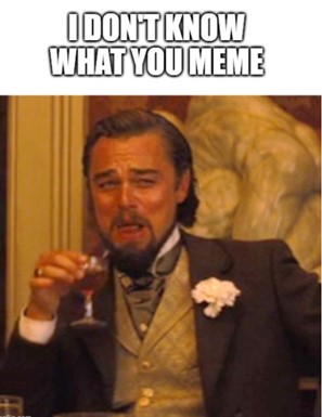 An internet meme of Leonardo DiCaprio from the movie Django Unchained where he laughs sarcastically with a grey evening suit, gold coloured waistcoat and pink flower in his lapel