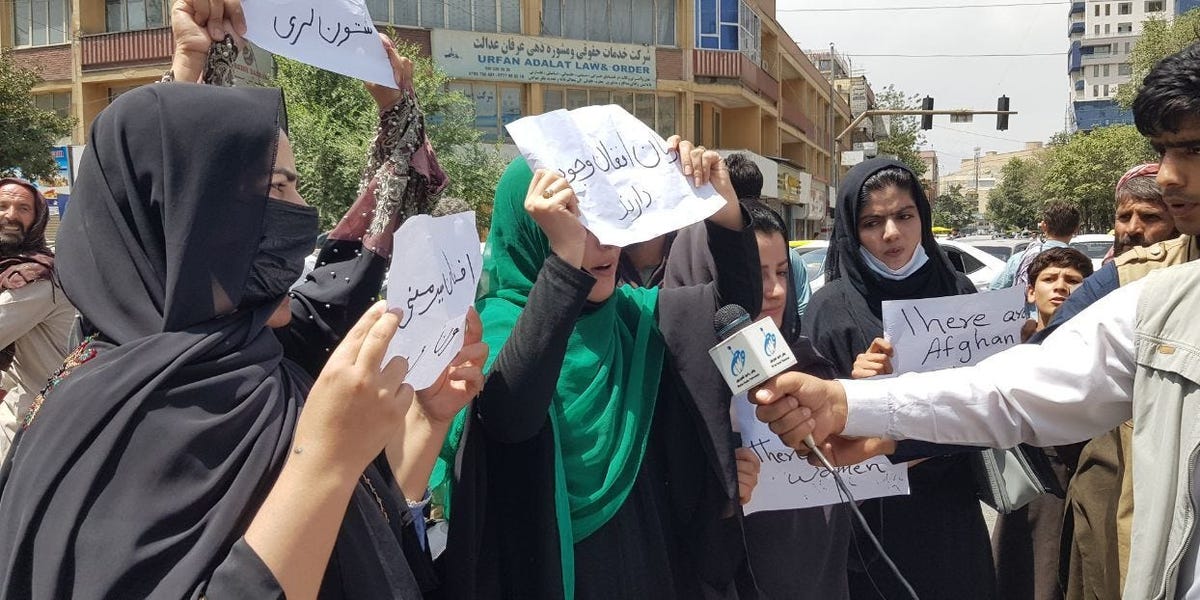 Afghan women gather to demand the protection of Afghan women's rights in front of the Presidential Palace in Kabul, Afghanistan on August 17, 2021.