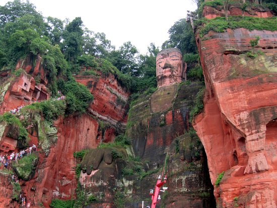 The Le Shan Giant Buddha. It is a stone sculpture of a Buddha in the mountain Le Shan. It's a religious symbol of Chinese Buddhism.