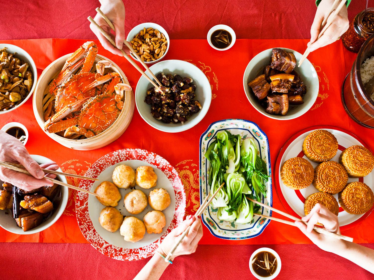 table full of traditional chinese foods