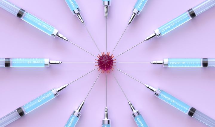 image of syringes pointing at the coronavirus