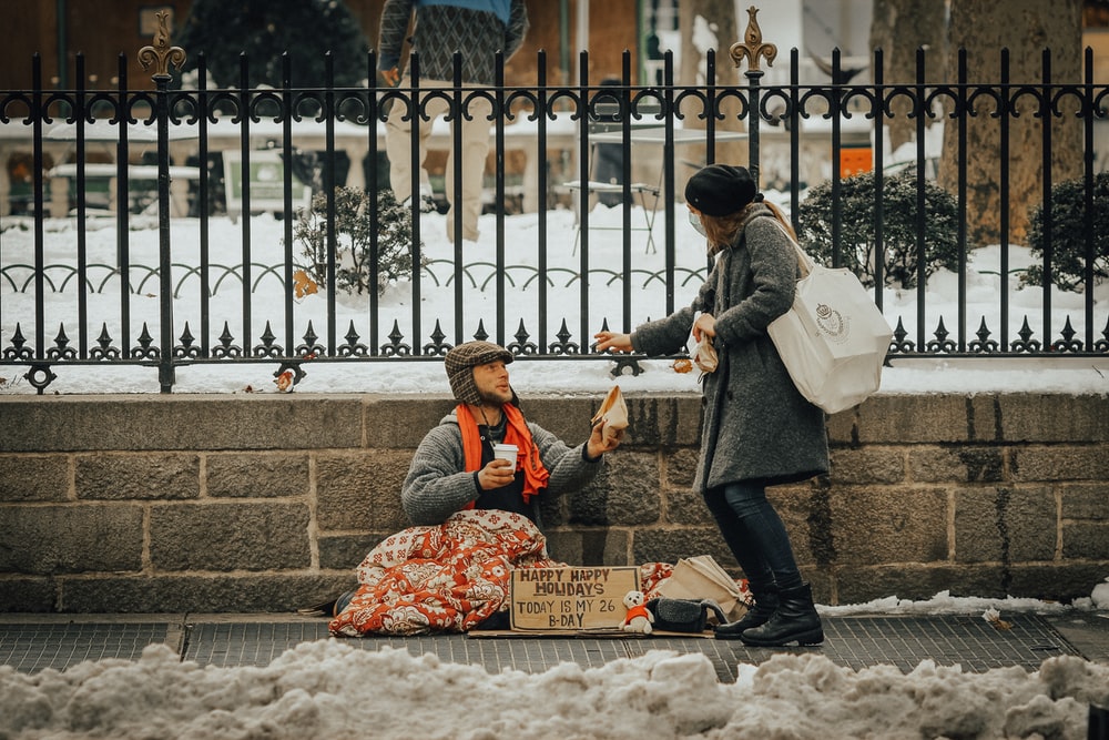 Homeless man on the street in winter