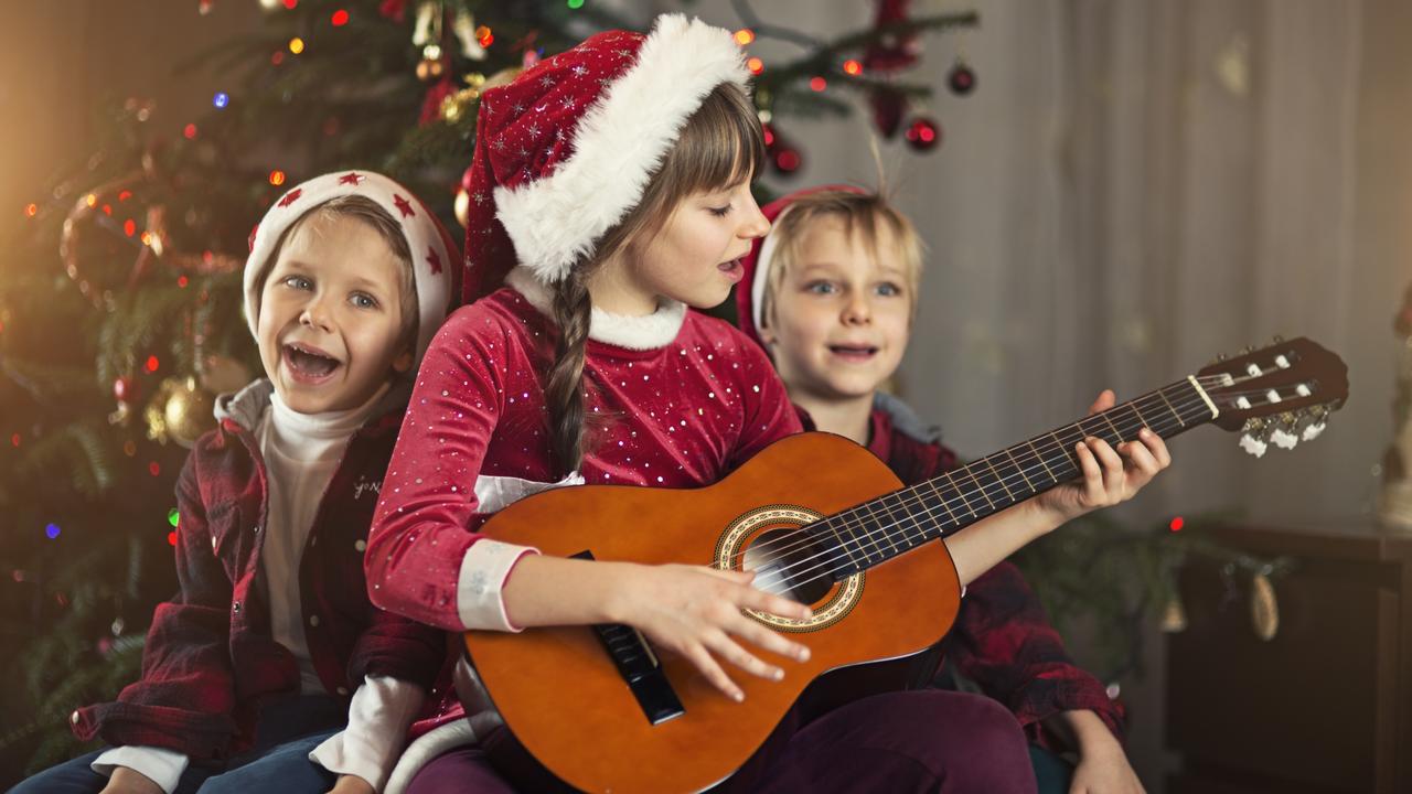 kids singing Christmas carols