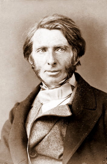 A black and white engraving of John Ruskin.