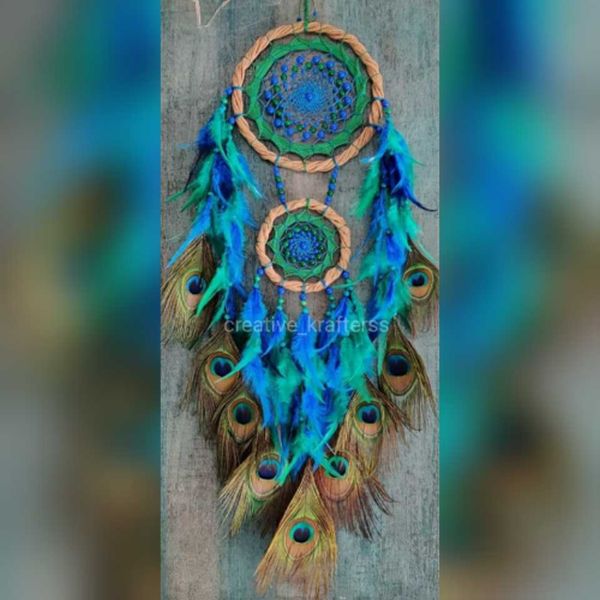 Beautiful blue dreamcatcher with the peacock feathers