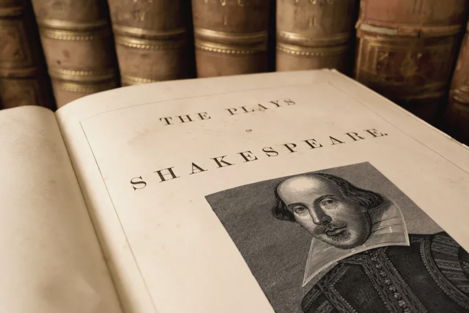 A close up of an open book about The Plays of Shakespeare