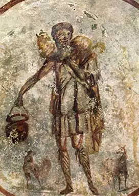 Early depiction of Jesus. He has short hair, no beard, and a calf around his shoulders.
