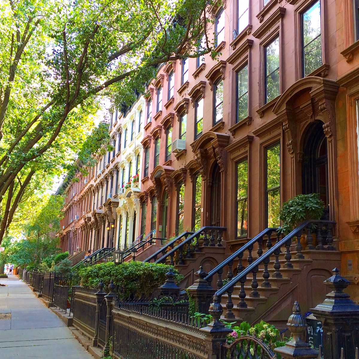 A brown rowhouse street in Park Slope